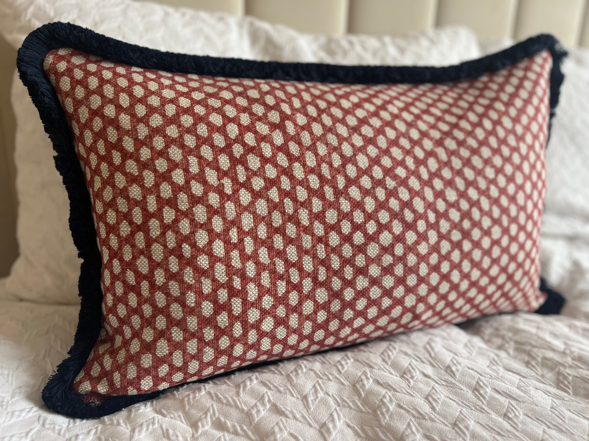 Luxury patterned cushions in Fermoie red Wicker fabric