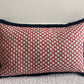 Luxury patterned cushions in Fermoie red Wicker fabric