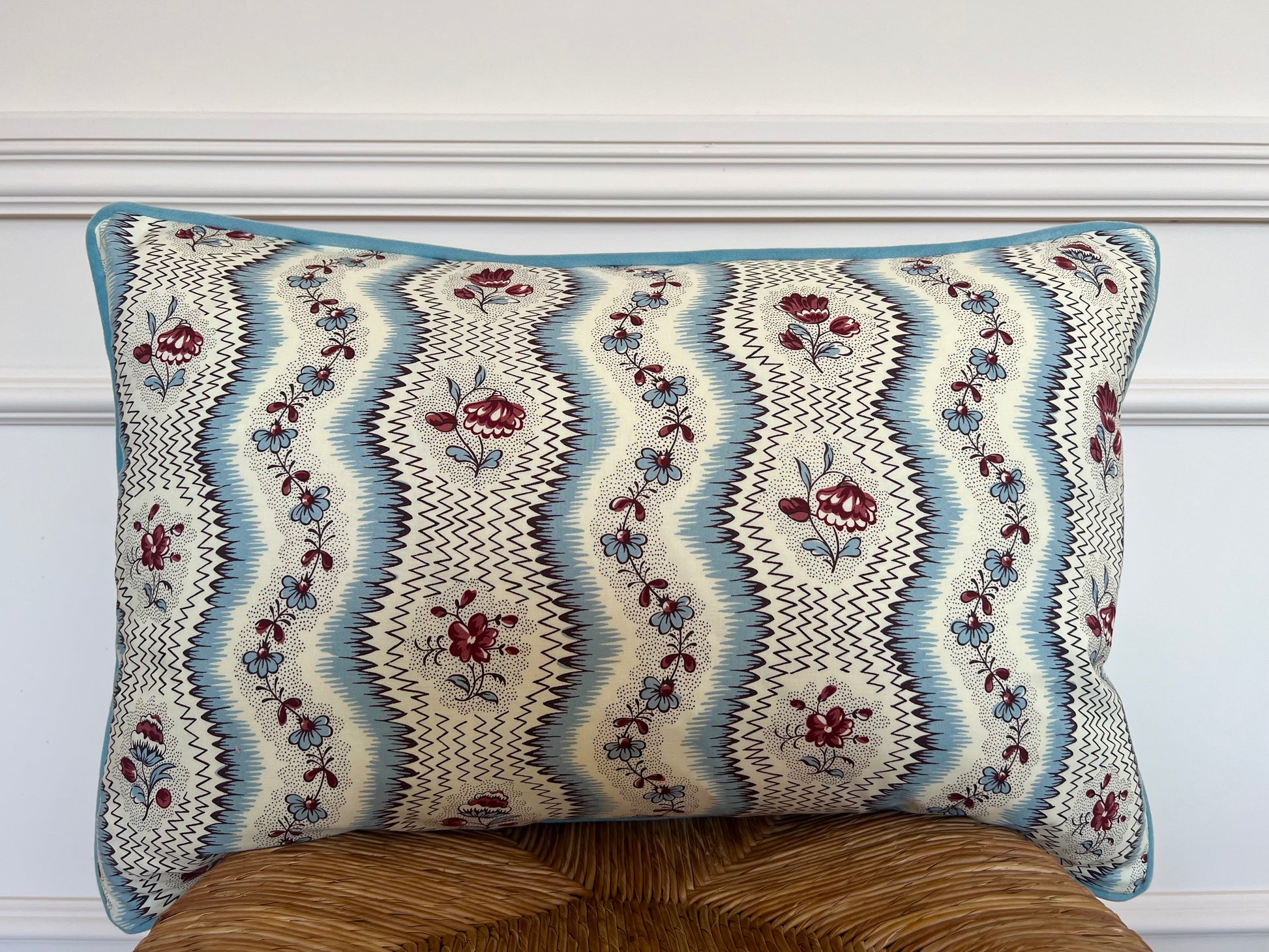 Cushions in Pierre Frey Le Manach Greuze fabric. Bleu Rouge colourway