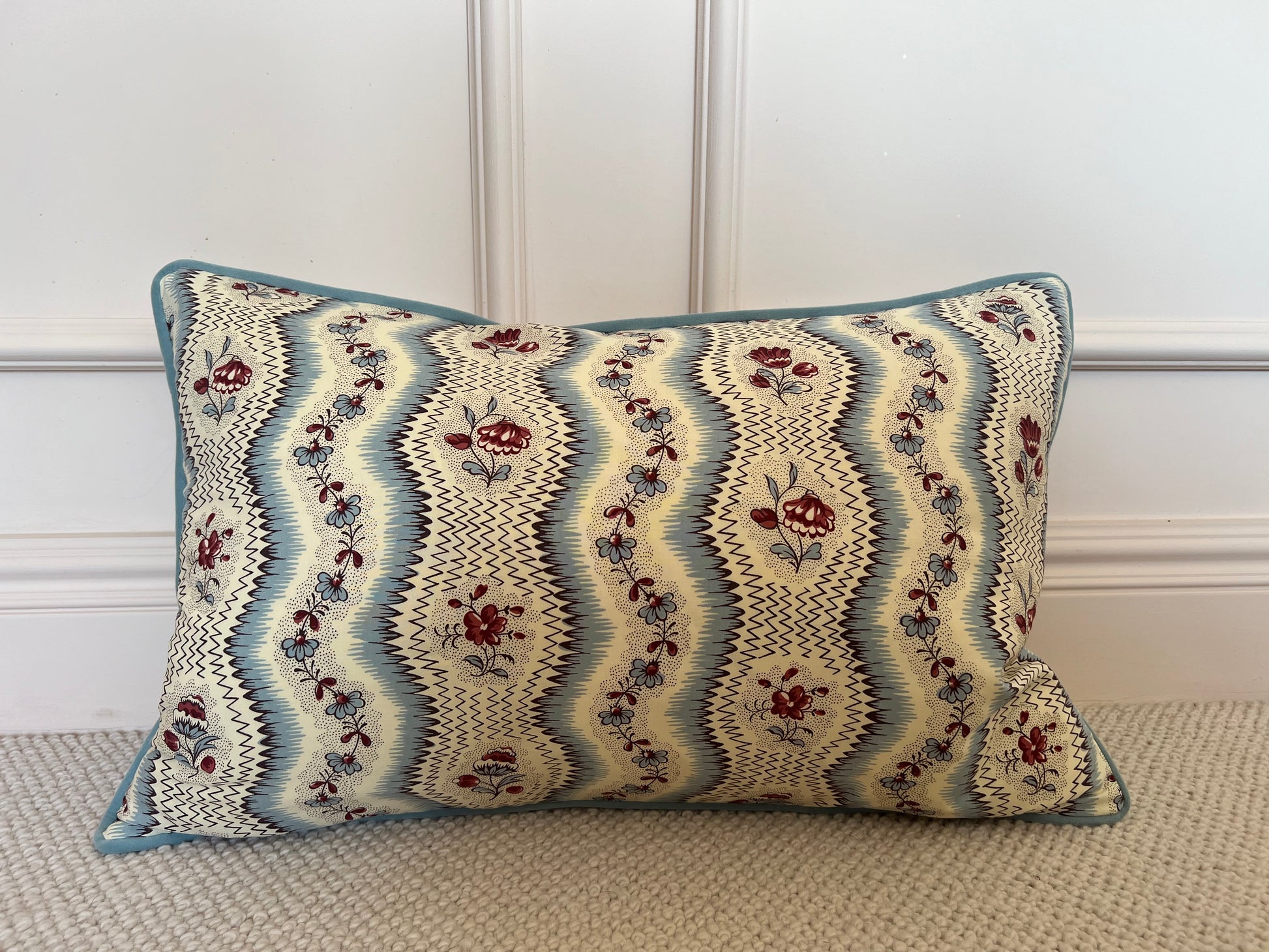 Cushions in Pierre Frey Le Manach Greuze fabric. Bleu Rouge colourway