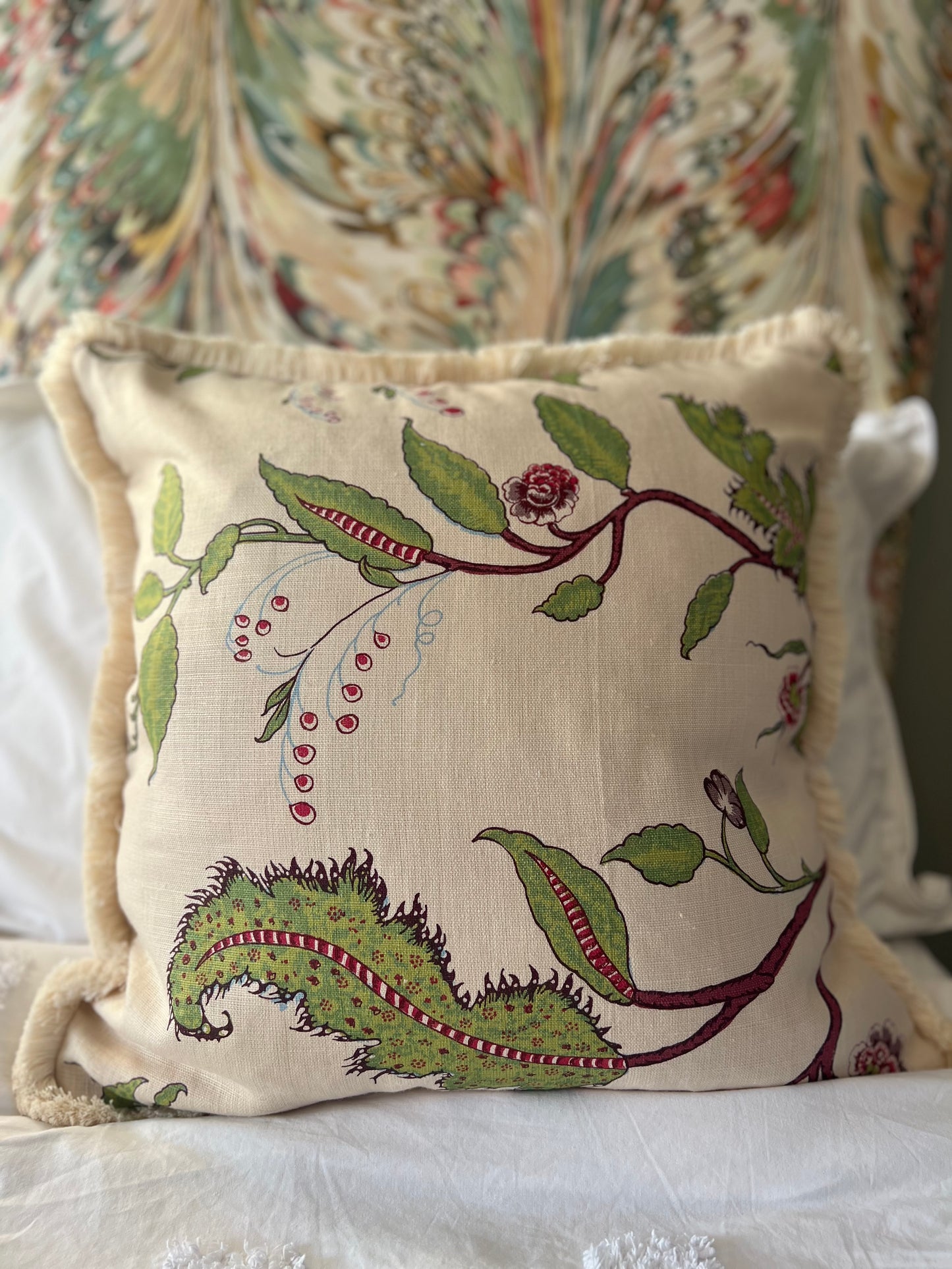 Luxury fringed cushions in Soane Britain Tendril Vine fabric (Apple & Plum colourway) 