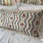 Cushions in Pierre Frey Le Manach Greuze fabric. Bleu Rouge colourway