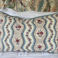 Cushions in Pierre Frey Le Manach Greuze fabric. Bleu Rouge colourway