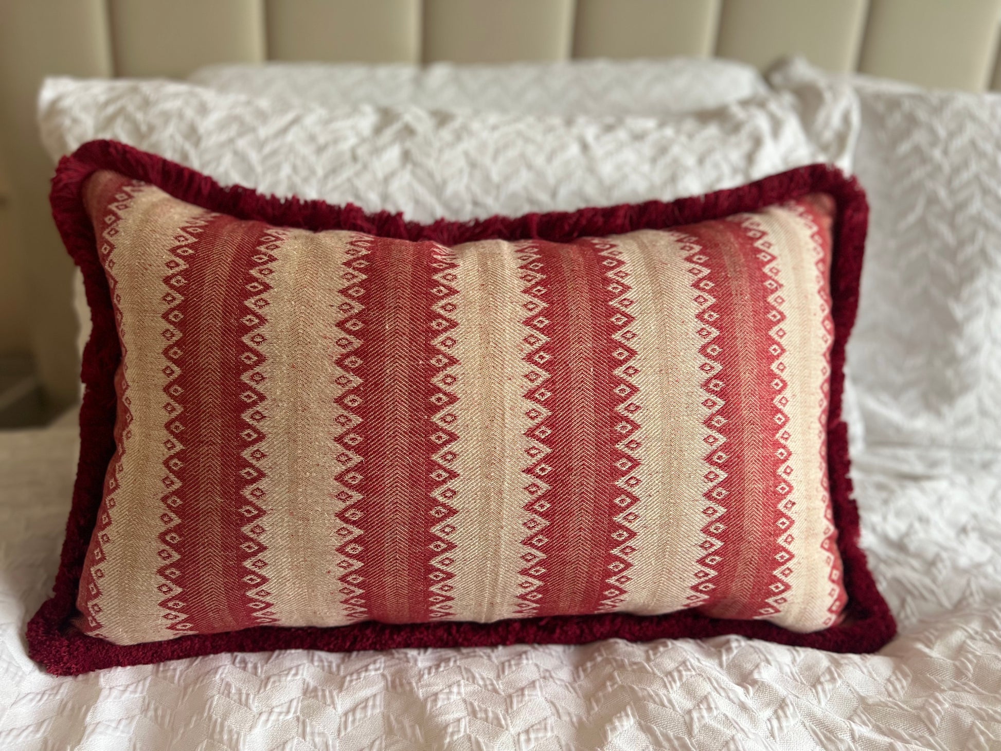 Luxury patterned cushions in Guy Goodfellow Cothay Stripe Campari designer fabric 