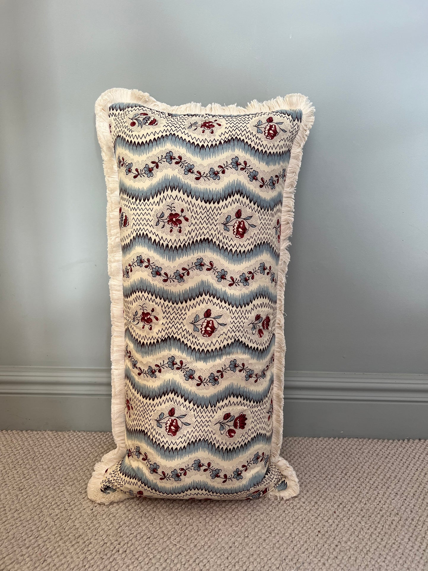 Cushions in Pierre Frey Le Manach Greuze fabric. Bleu Rouge colourway