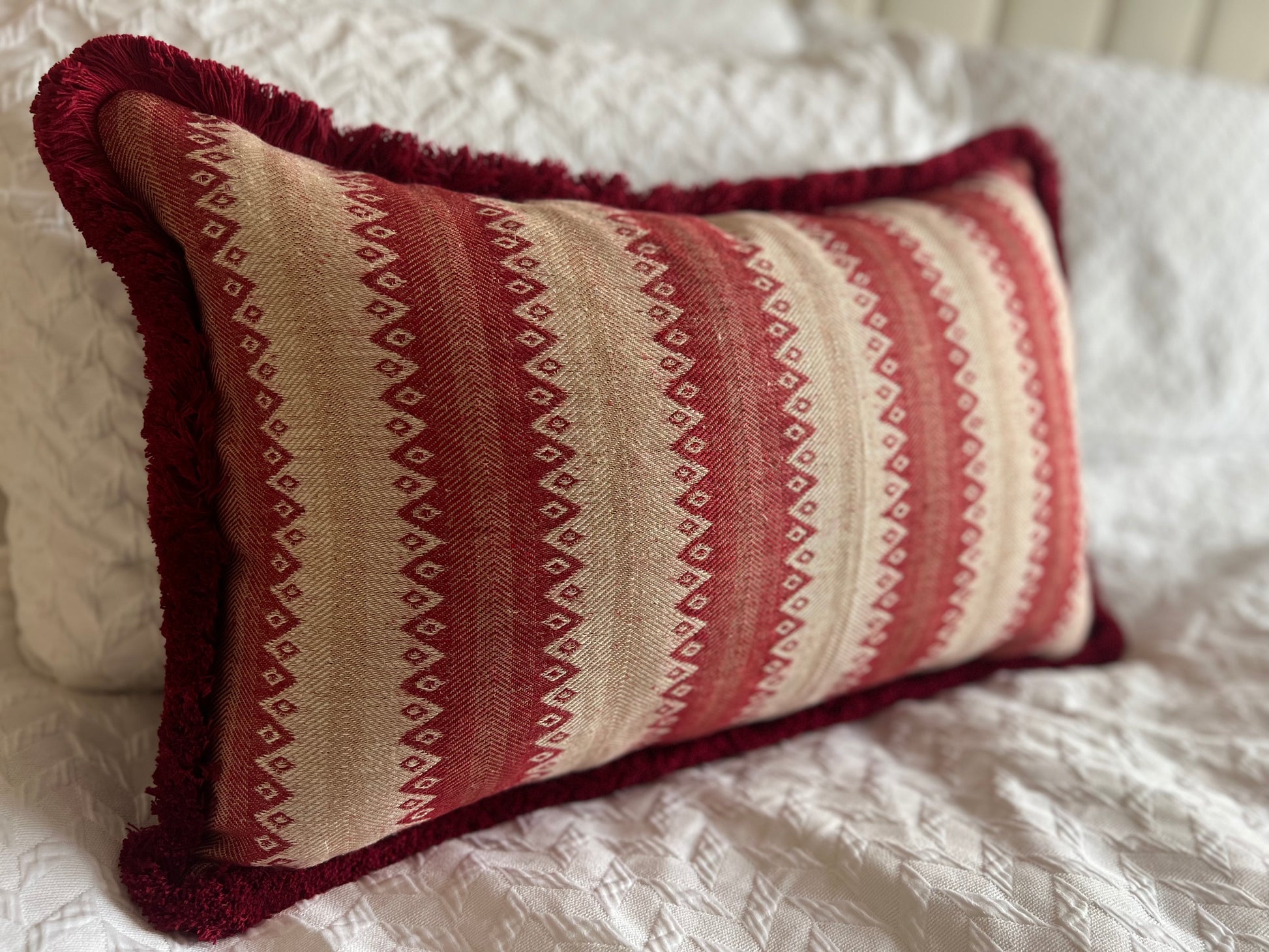 Luxury patterned cushions in Guy Goodfellow Cothay Stripe Campari designer fabric 