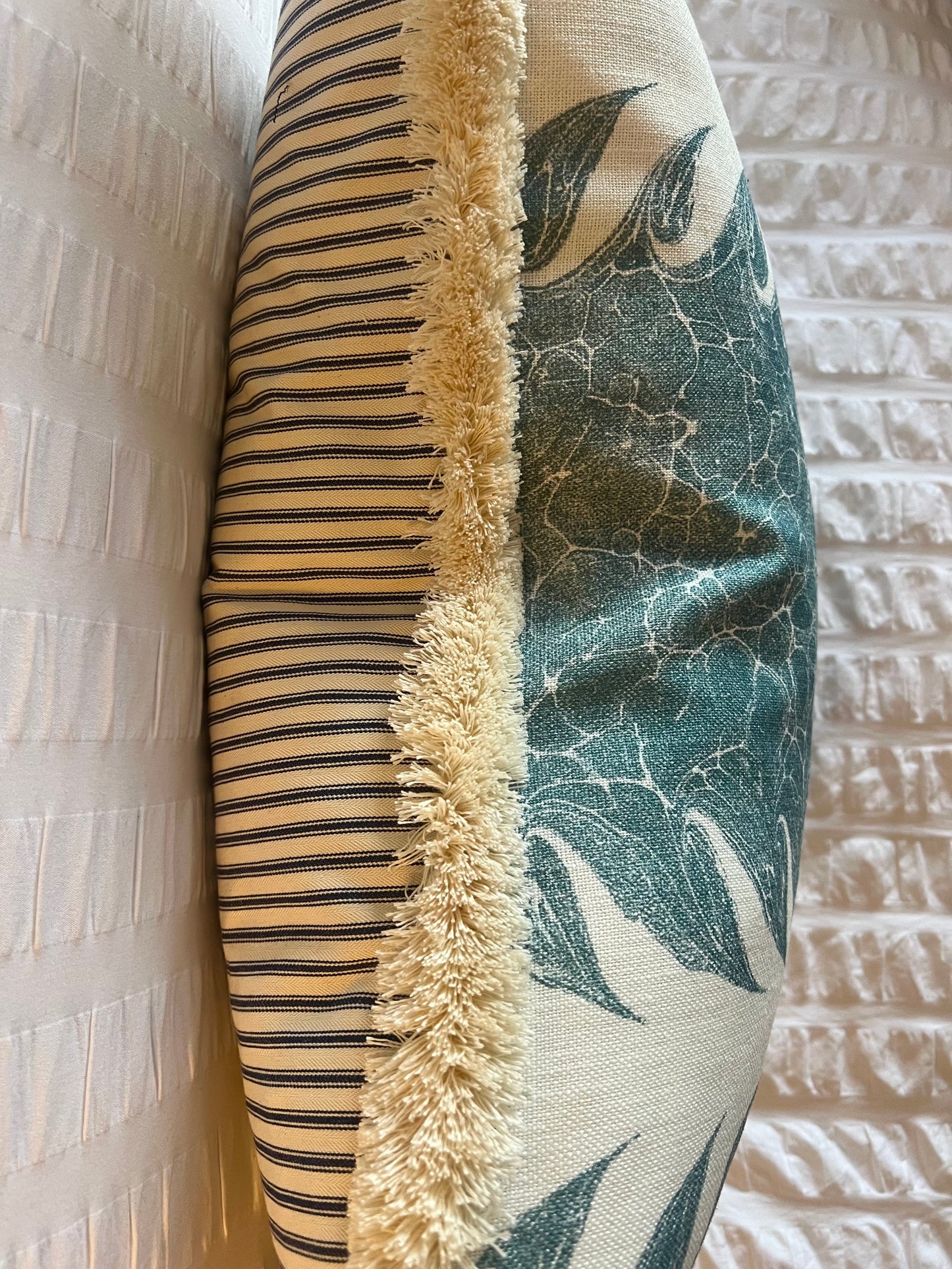 Luxury cushions in Beata Heuman’s Palm Drop fabric. Sky Blue / Plaster colourway with brush fringe trim