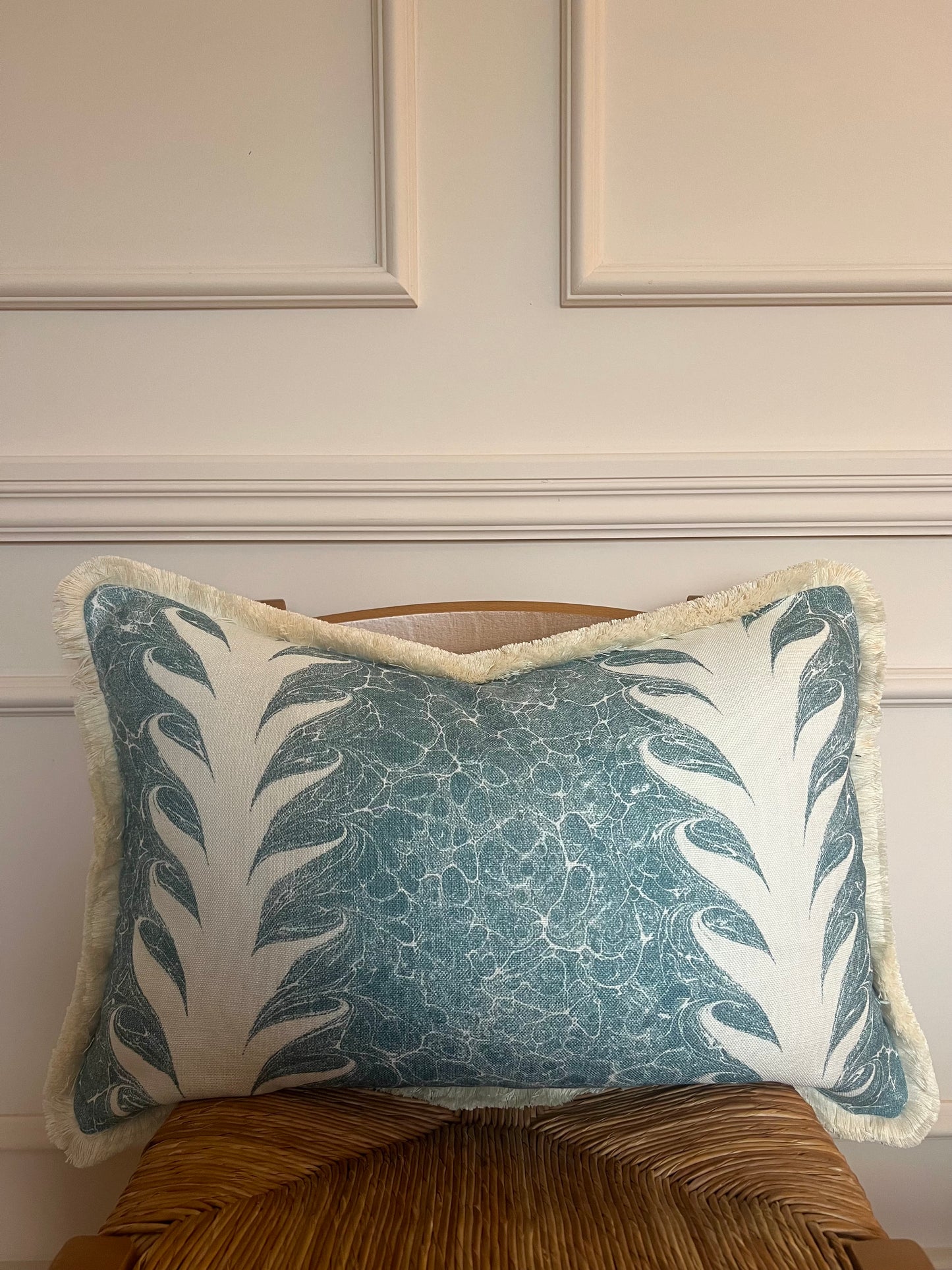 Luxury cushions in Beata Heuman’s Palm Drop fabric. Sky Blue / Plaster colourway with brush fringe trim