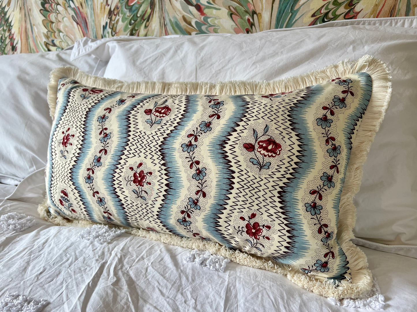 Cushions in Pierre Frey Le Manach Greuze fabric. Bleu Rouge colourway