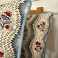 Luxury designer cushion in Pierre Frey Le Manach Greuze fabric with piping 